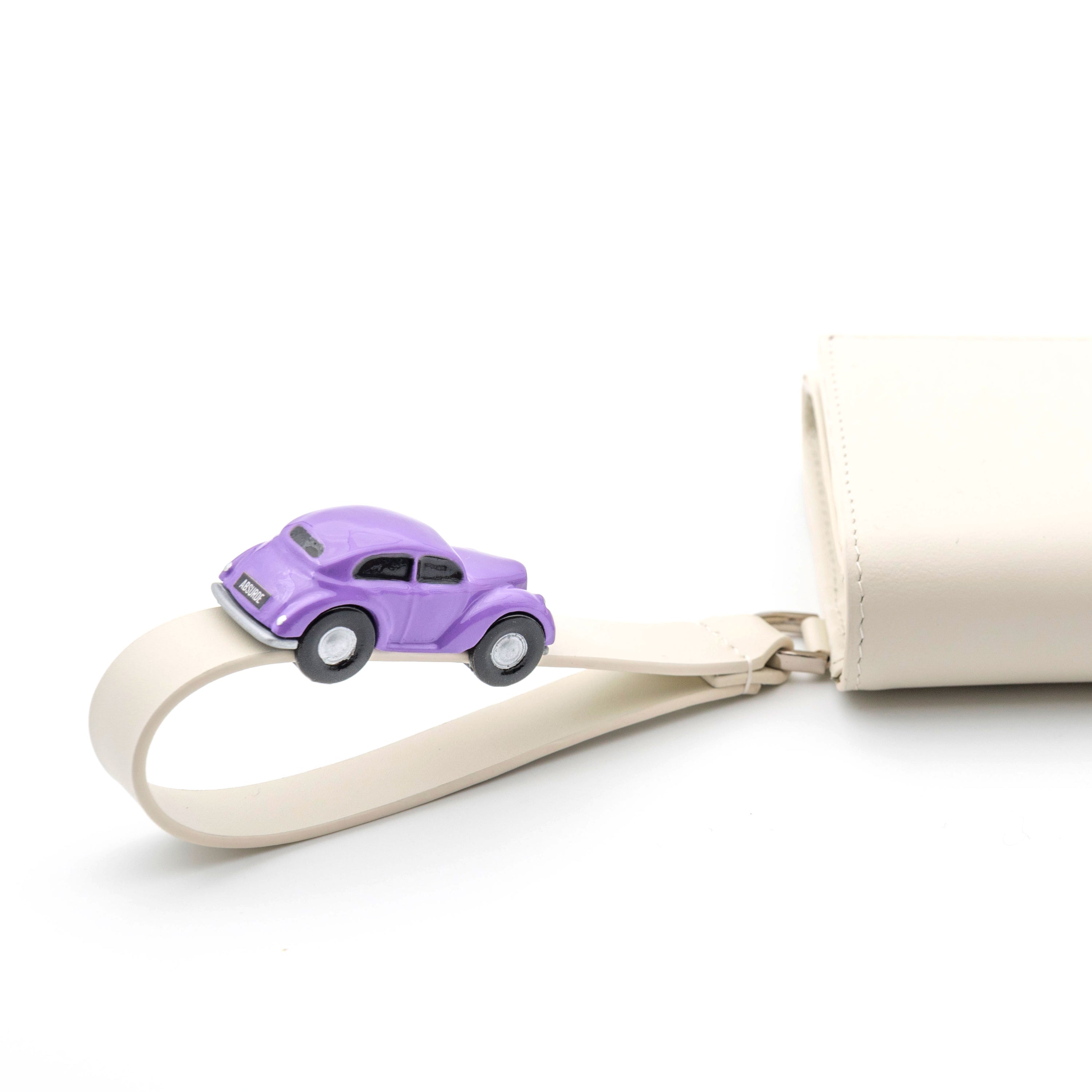 PARKING Off-white Leather bifold wallet with purple car